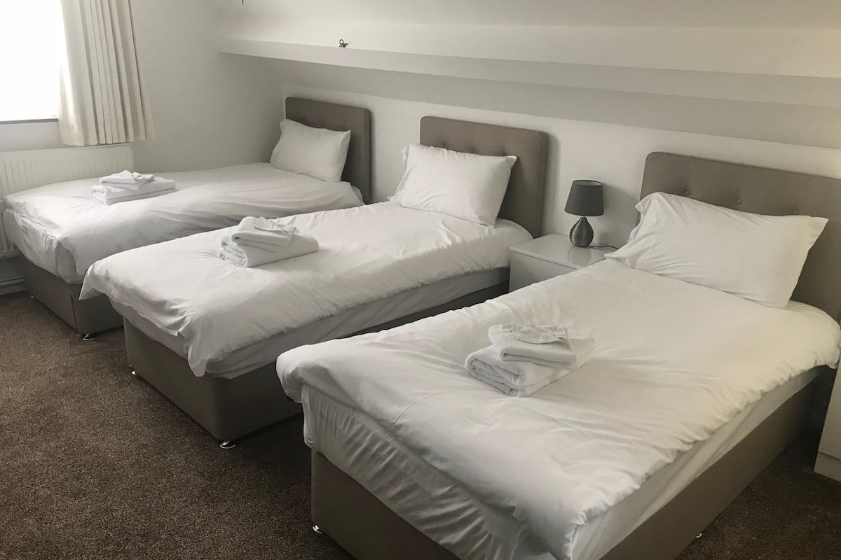 family room (12) | premium bedding, desk, laptop workspace, iron/ironing board