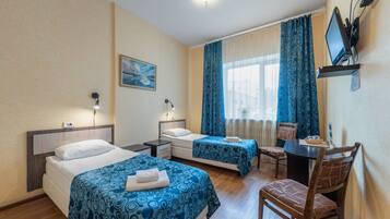 Habitación estándar con 2 camas individuales | Wifi gratis y ropa de cama