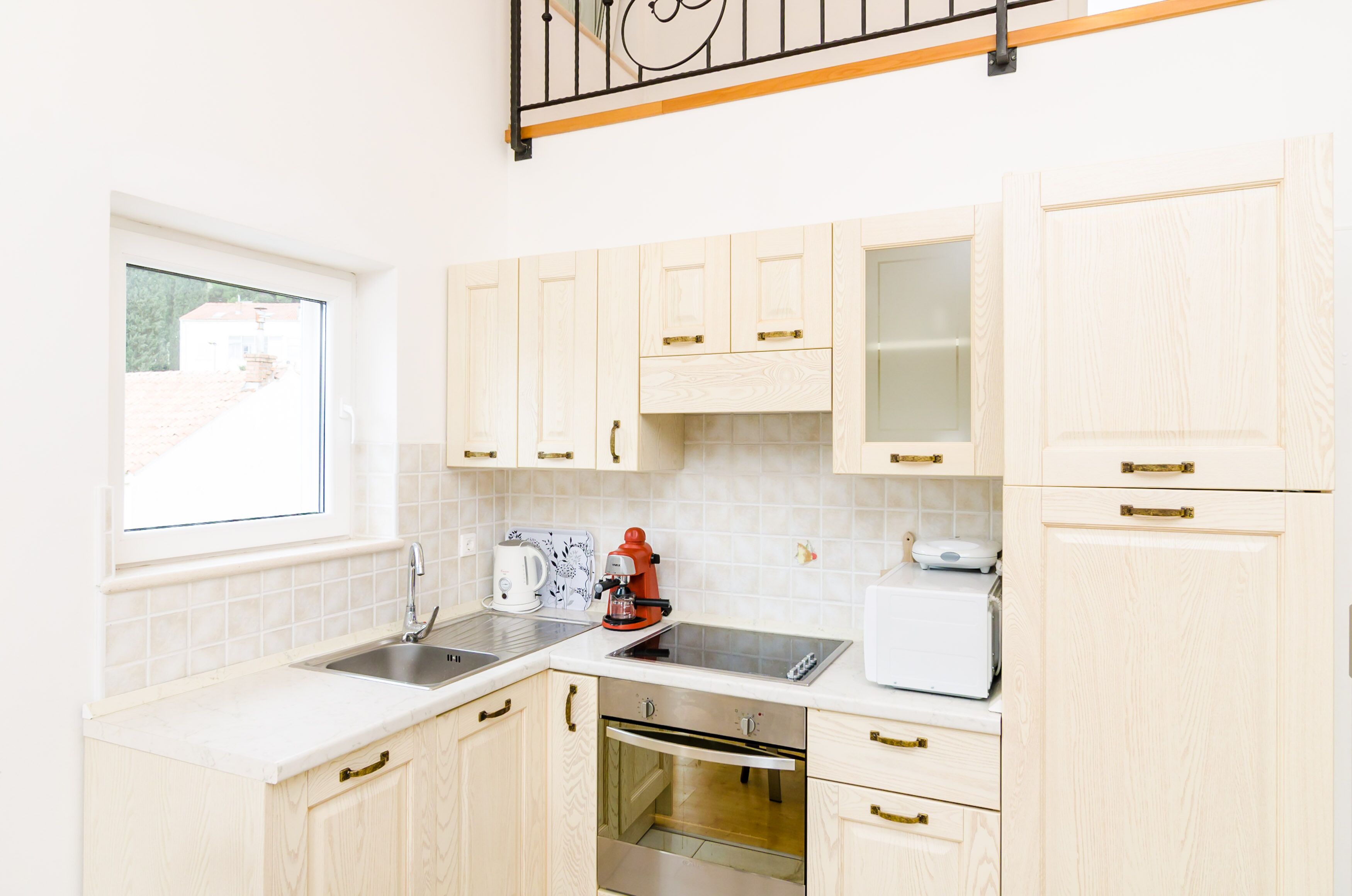 city apartment, 1 bedroom, balcony (a2) | private kitchen | full-sized fridge, microwave, oven, stovetop