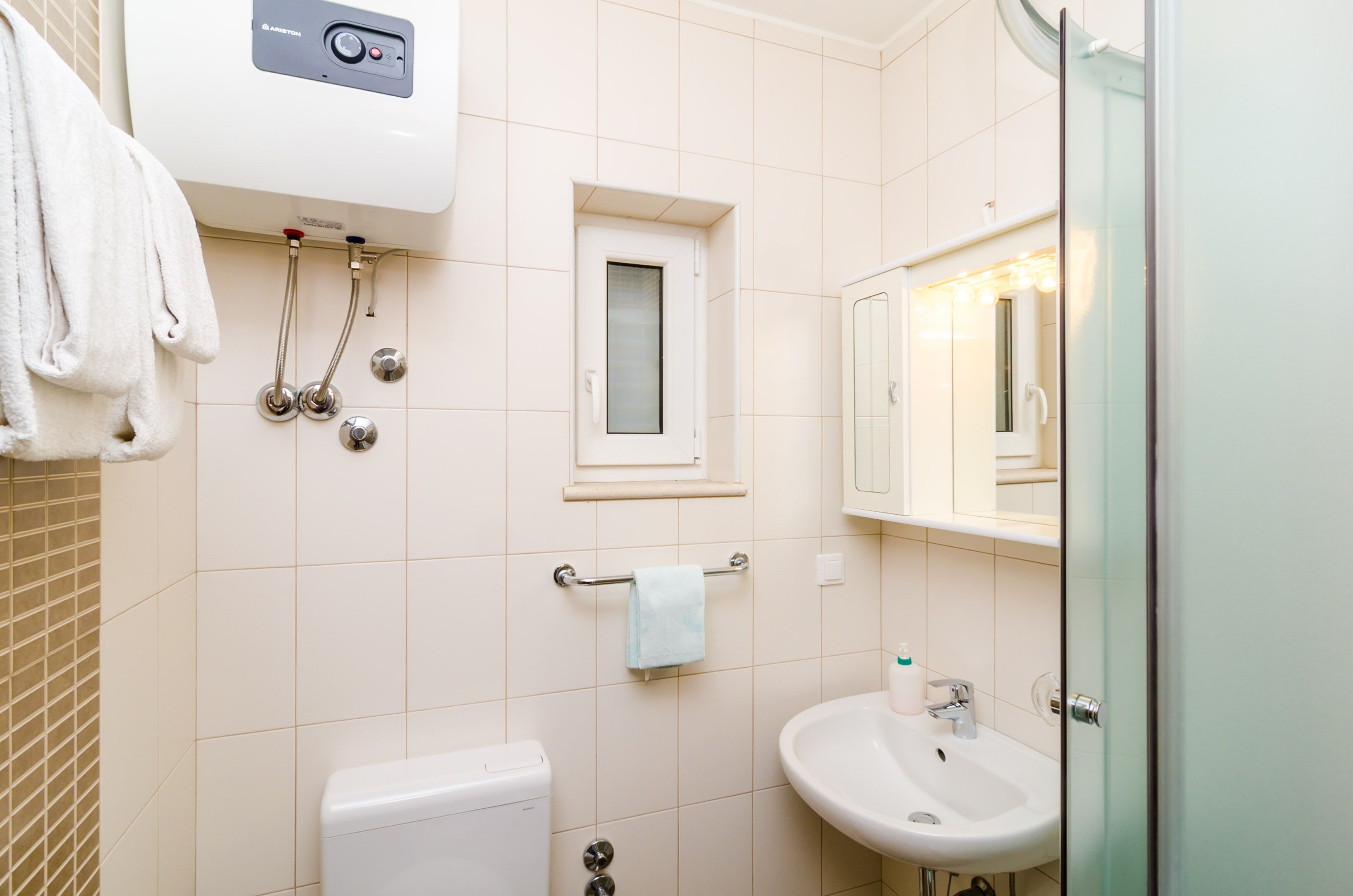 apartment, 1 bedroom, terrace, garden view (a4) | bathroom | shower, rainfall showerhead, hair dryer, towels