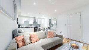 City Apartment, 1 Bedroom, Accessible, City View | Living room | TV
