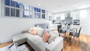 City Apartment, 1 Bedroom, Accessible, City View | Living room | TV