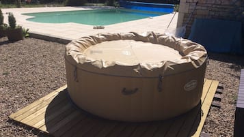 Seasonal outdoor pool, pool umbrellas, pool loungers