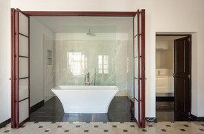 Bathtub, hair dryer, towels