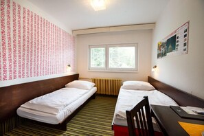 Desk, soundproofing, free cots/infant beds, rollaway beds