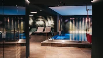 Indoor pool, open 7:00 AM to 7:00 PM, pool loungers