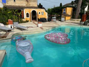 Outdoor pool, pool umbrellas, pool loungers