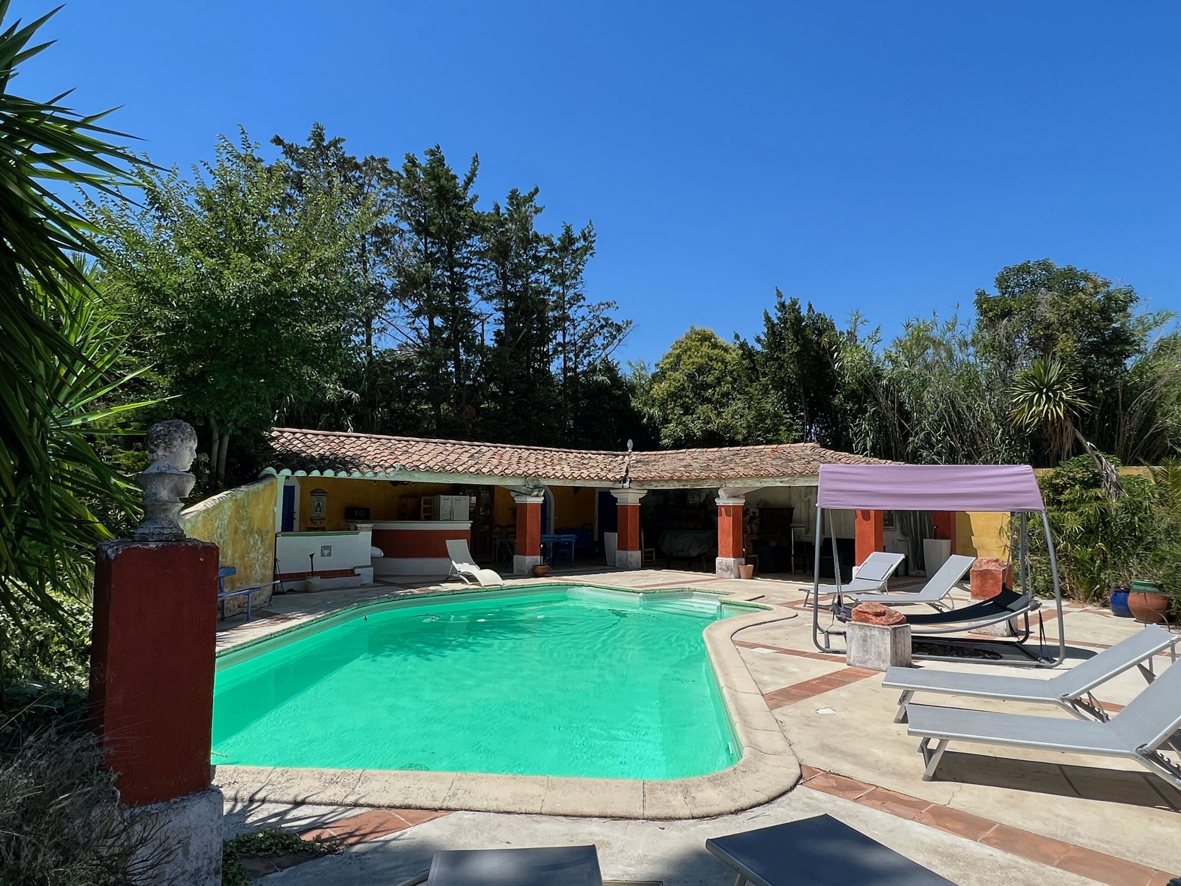 Outdoor pool, pool umbrellas, pool loungers