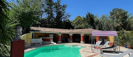 Outdoor pool, pool umbrellas, pool loungers