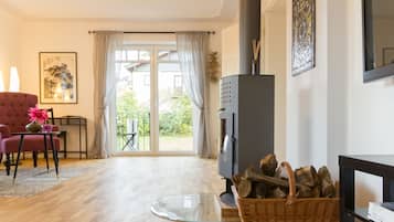 Condo, 3 Bedrooms, Balcony, Ground Floor (Flat 1) | Living room | Flat-screen TV, fireplace