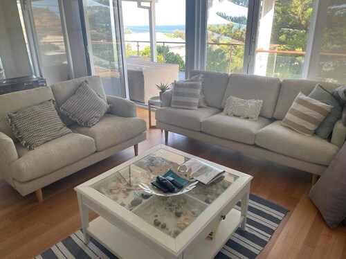 Beach House for Family or Couples with views & 2 minute walk to beach and shops