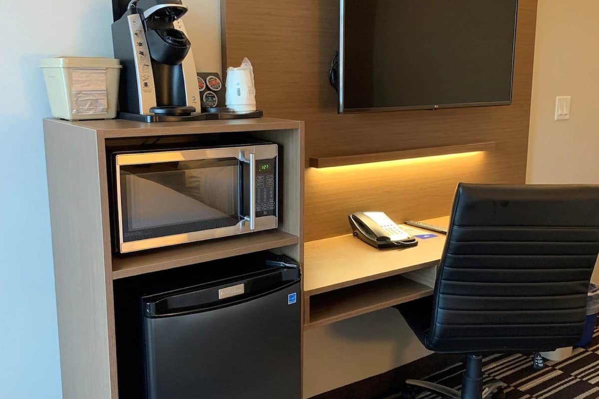 desk, blackout curtains, iron/ironing board, free cots/infant beds