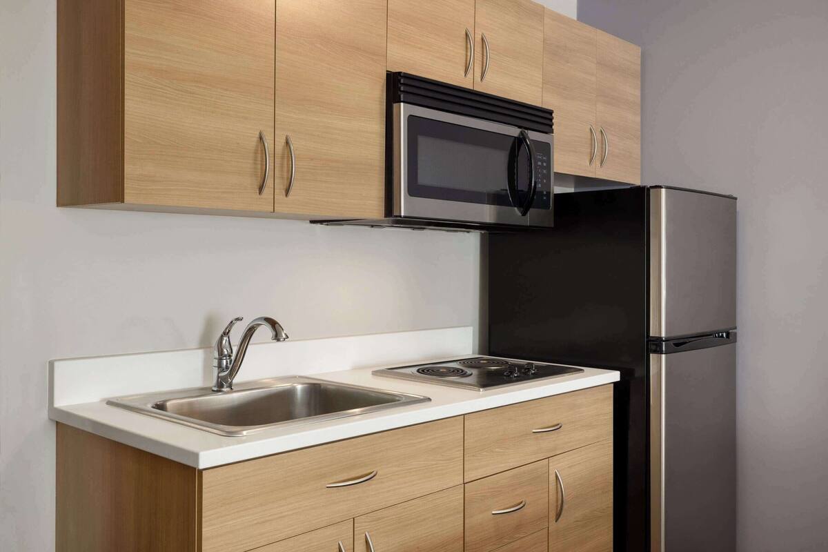 desk, blackout curtains, iron/ironing board, free cots/infant beds