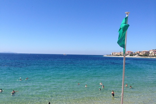 On the beach, beach towels