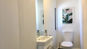 1 Bedroom - Located above a commercial space with central opened staircase that lead to it | Bathroom - Number 1 - Chic Inner City Rooms (Christchurch)