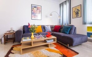 Studio Confort, 1 chambre | Coin séjour | Télévisions à écran plasma