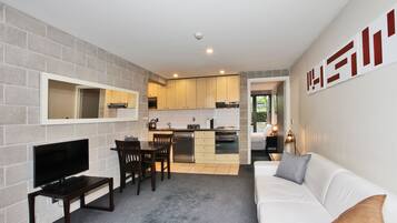 Apartment, 1 Queen Bed with Sofa bed | Living area | Flat-screen TV