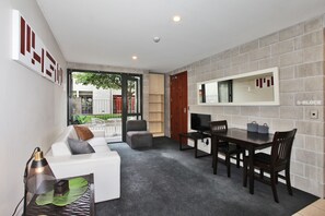 Apartment, 1 Queen Bed with Sofa bed | Living room | Flat-screen TV - Central City Vibe (Christchurch)