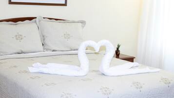 Down comforters, Tempur-Pedic beds, in-room safe, desk