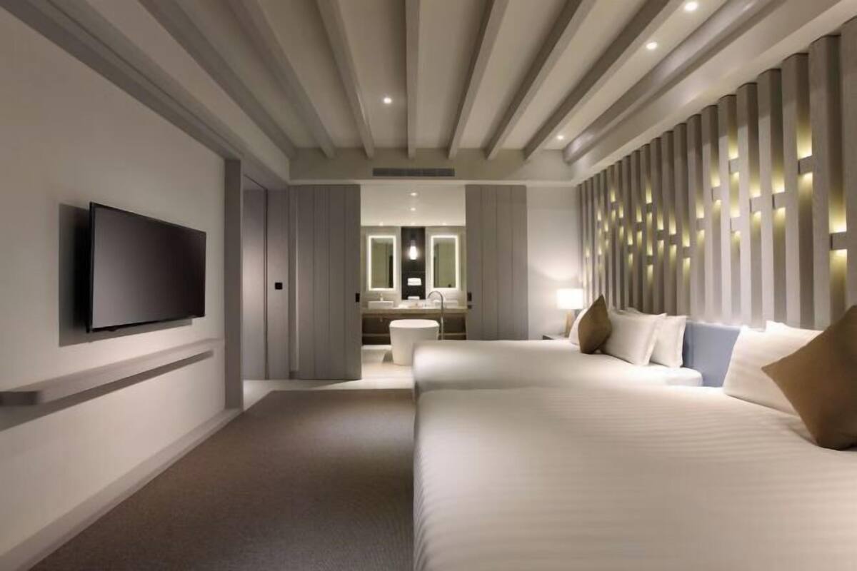 Premium bedding, down duvets, in-room safe, desk