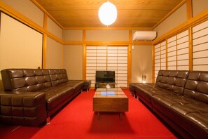 Japanese Style Townhouse | Living area | Flat-screen TV - Hiroshima Danbara Guesthouse by EXseed (Hiroshima)