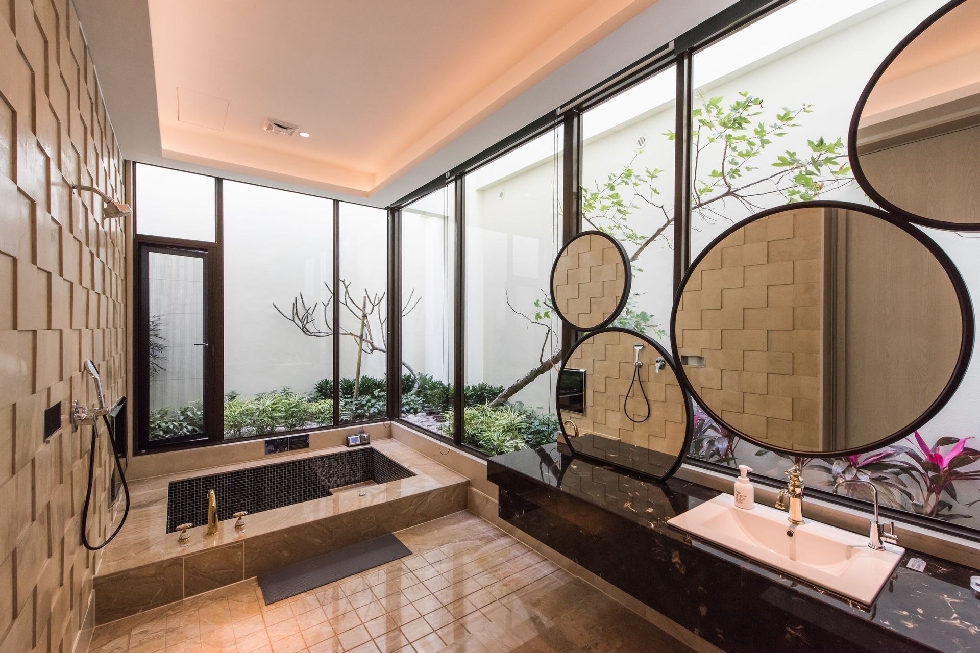 separate bathtub and shower, deep-soaking bathtub, designer toiletries