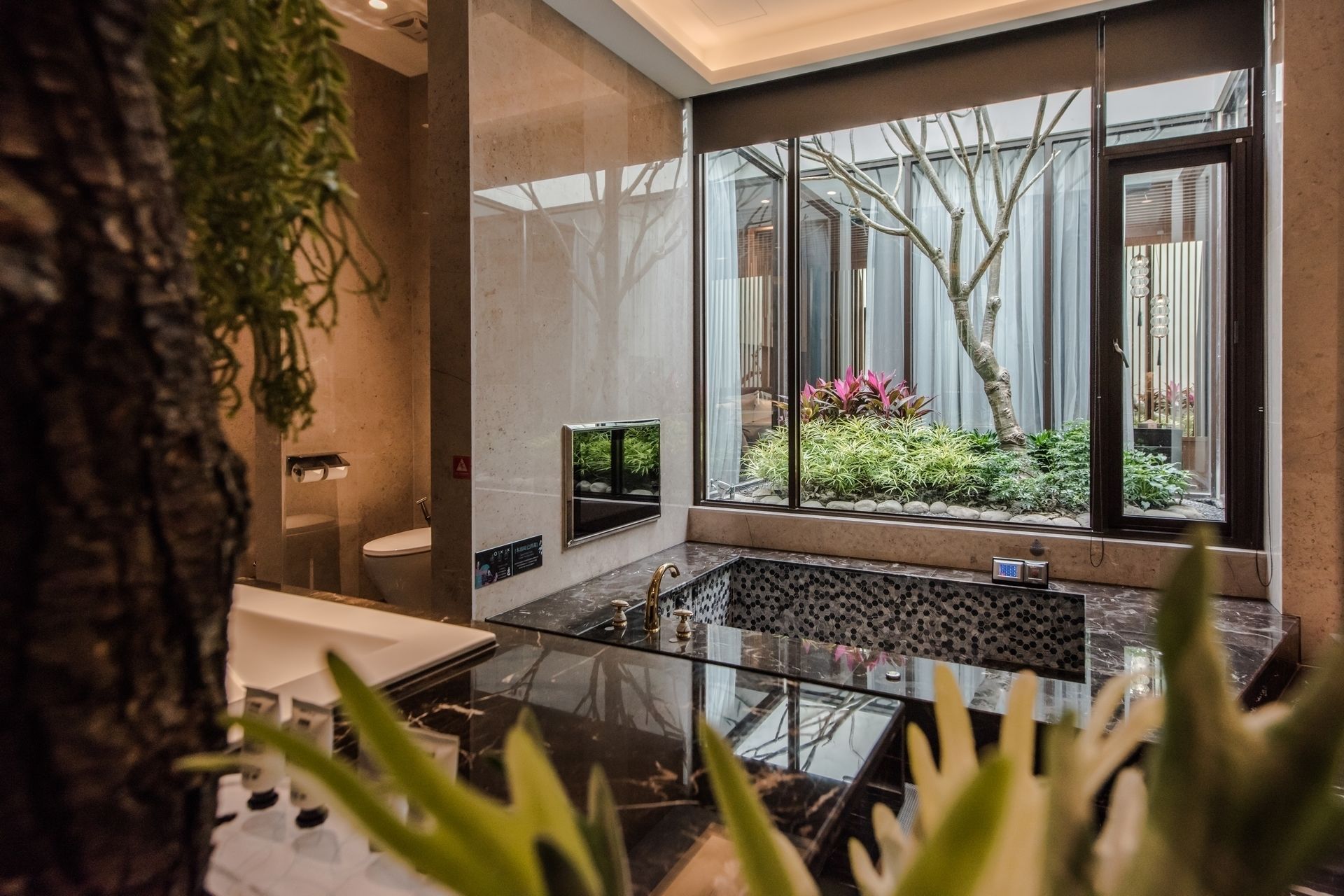 separate bathtub and shower, deep-soaking bathtub, designer toiletries