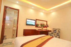 Quarto standard | Frigobar, escrivaninha, cortinas blackout, Wi-Fi de cortesia