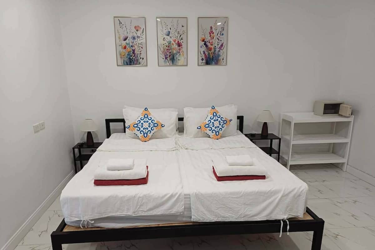 Deluxe Triple Room with View | Minibar (free items), in-room safe, desk, blackout drapes