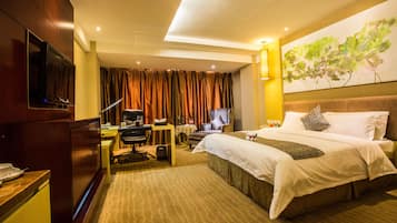 Deluxe Double or Twin Room | Minibar, in-room safe, desk, blackout drapes