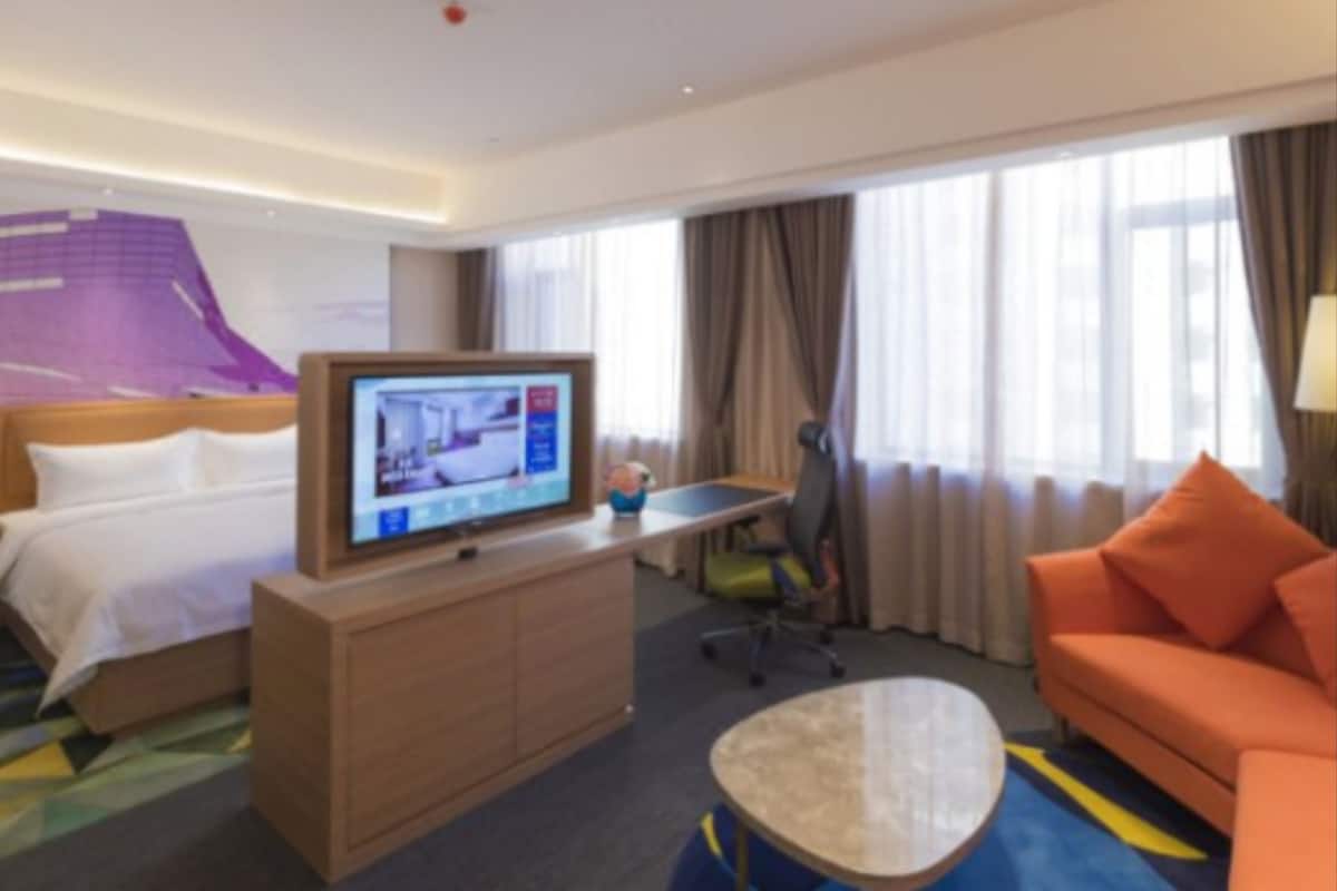 Habitación Business doble | Minibar, escritorio, cortinas opacas y tabla de planchar con plancha