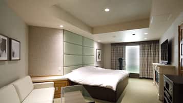 Habitación doble Deluxe | Minibar, decoración personalizada, muebles diferentes y escritorio