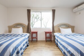 1 غرفة نوم وألحفة محشوة بالريش ومكواة/لوح كي وواي فاي مجانًا