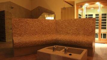 Enjoy a refreshing shower in this bathroom with a sink and shower area.
