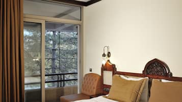 Standard Triple Room | Minibar, in-room safe, soundproofing, iron/ironing board