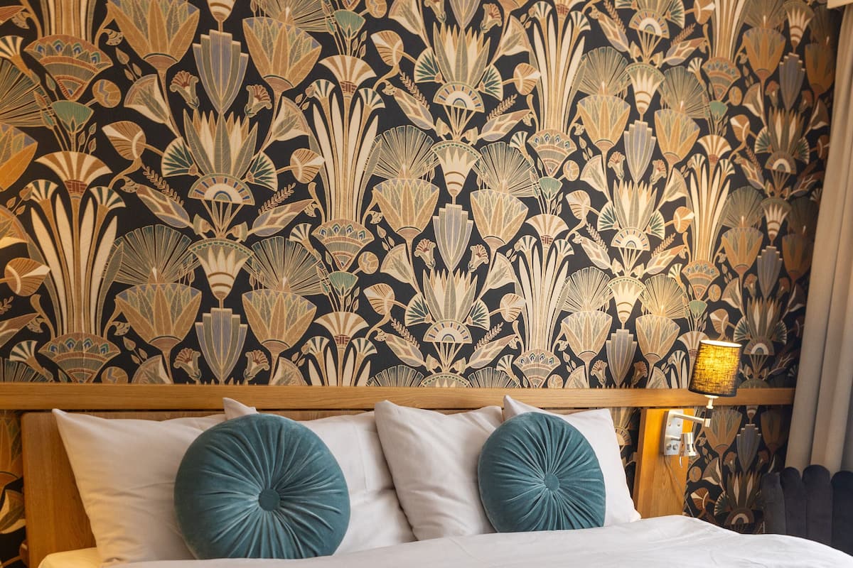 premium garden view | 1 bedroom, hypo-allergenic bedding, desk, blackout curtains