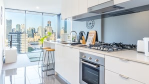 Merivale St 21903 - Designer Apartment with Panoramic City and River View | Private kitchen | Coffee/tea maker, full-size fridge, microwave, oven - Homely Apartment in South Brisbane (South Brisbane)