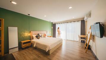 Family Room Pool View | Premium bedding, free WiFi, bed sheets