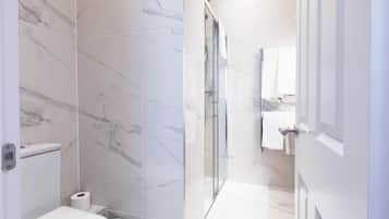 Shower, free toiletries, hair dryer, towels