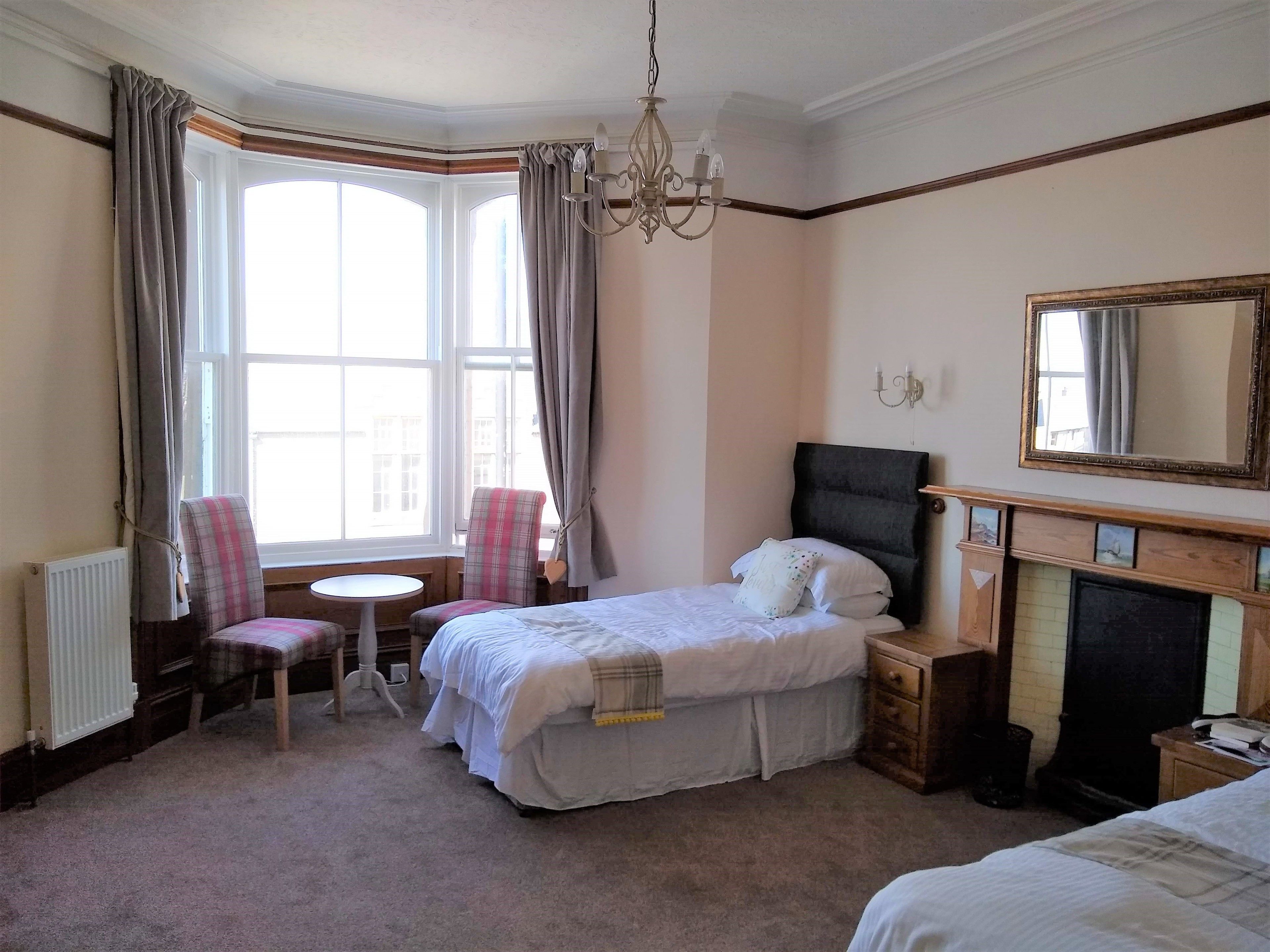 family room, ensuite, ocean view | 1 bedroom, premium bedding, laptop workspace, iron/ironing board