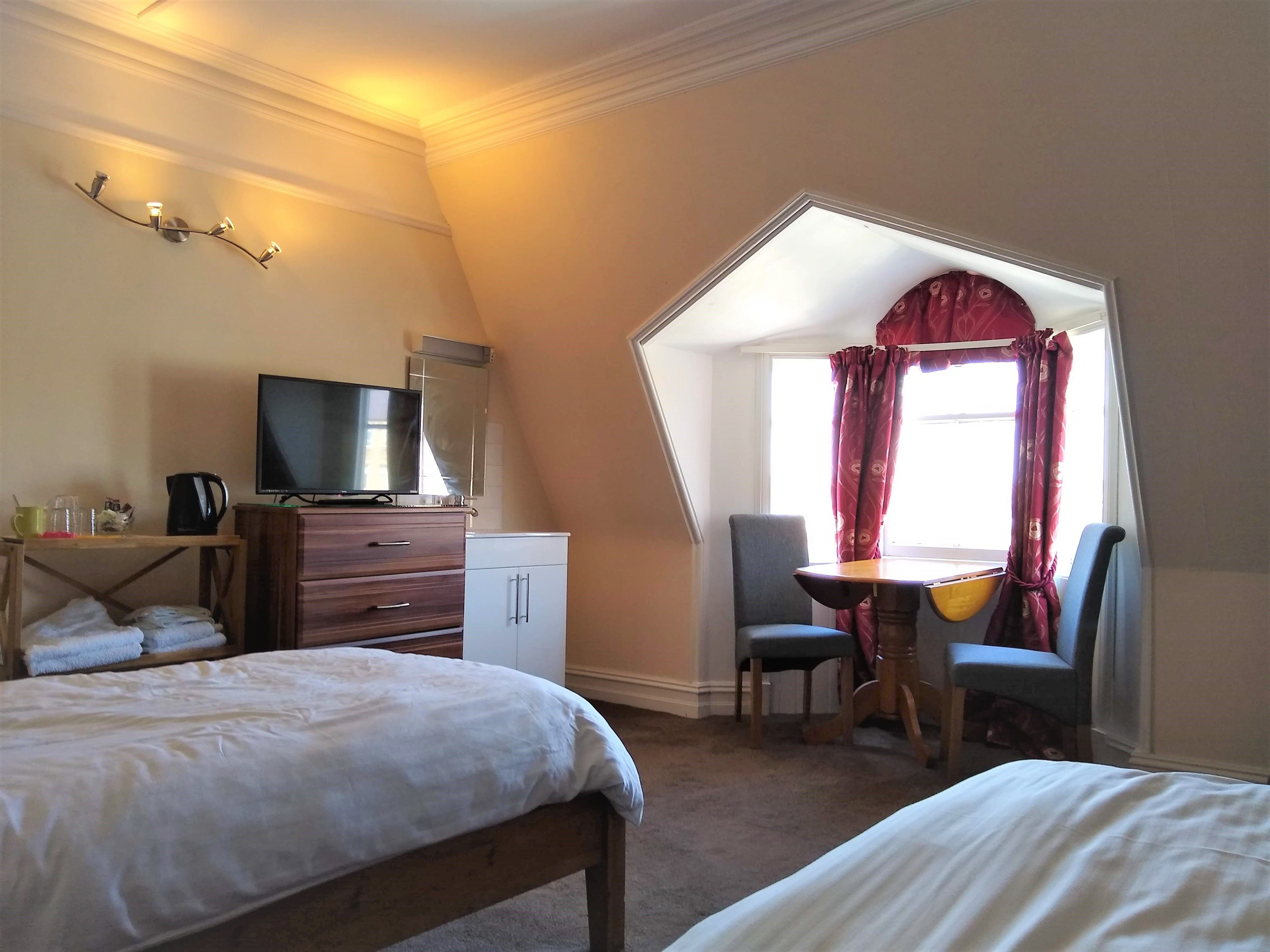 twin room, 2 single beds, shared bathroom | 1 bedroom, premium bedding, laptop workspace, iron/ironing board