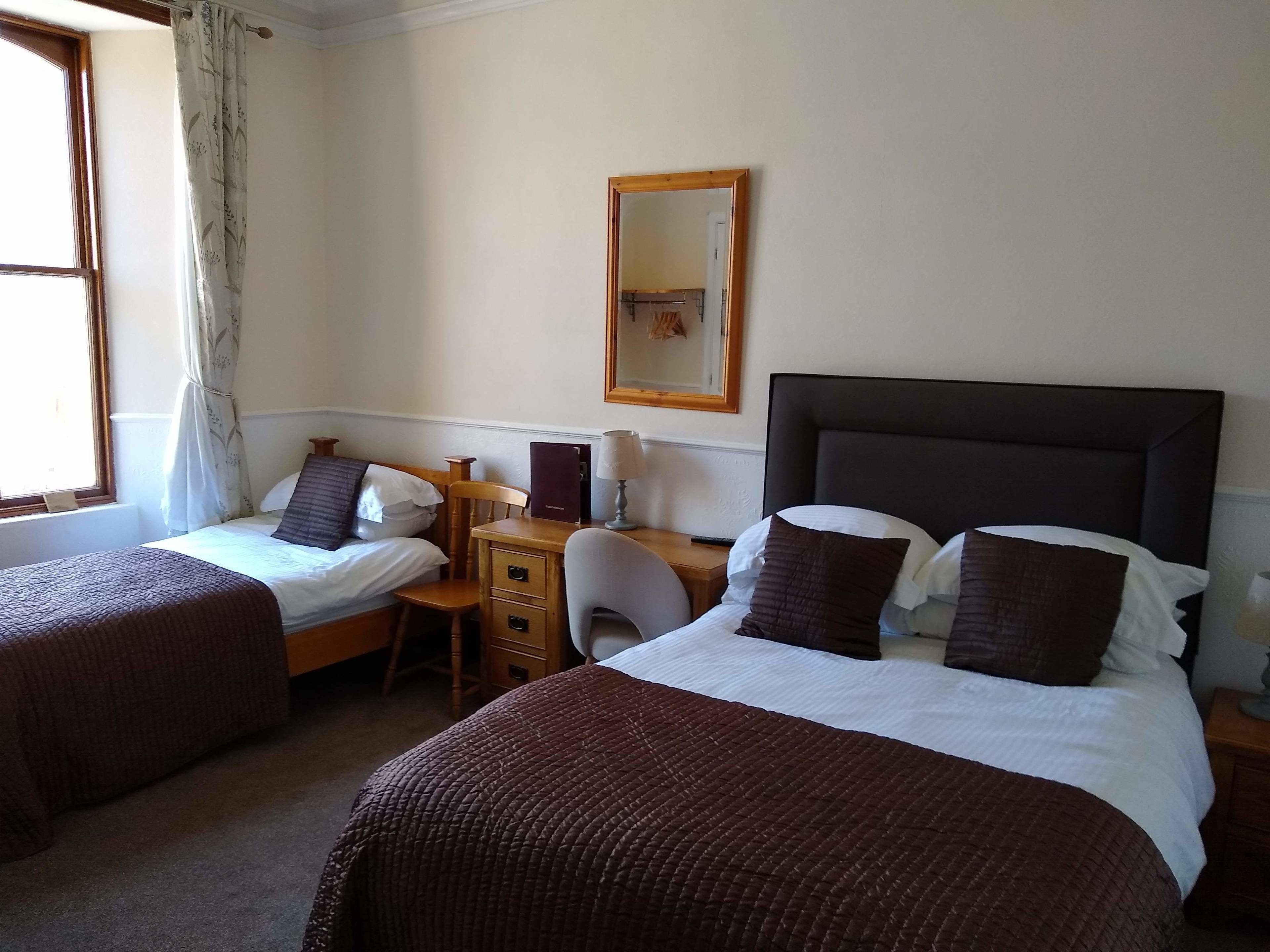 family room, ensuite, garden view | 1 bedroom, premium bedding, laptop workspace, iron/ironing board