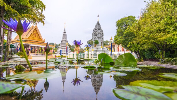 A temple complex with lotus ponds and traditional architecture. - Botum Palace Hotel (Phnom Penh)