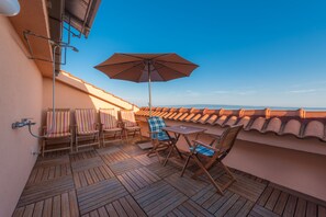 Duplex, vista para o mar | Terraço/pátio