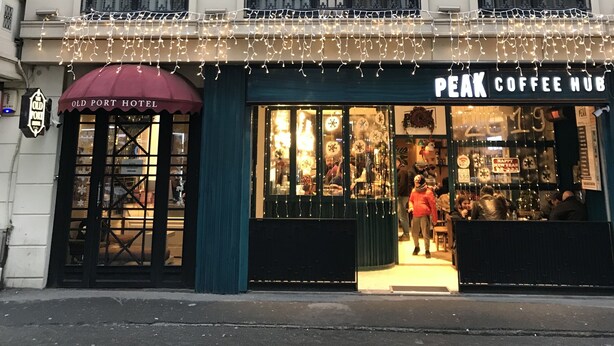 A building with a coffee shop named "Peak Coffee Hub" on the ground floor. - Old Port Hotel (Istanbul)
