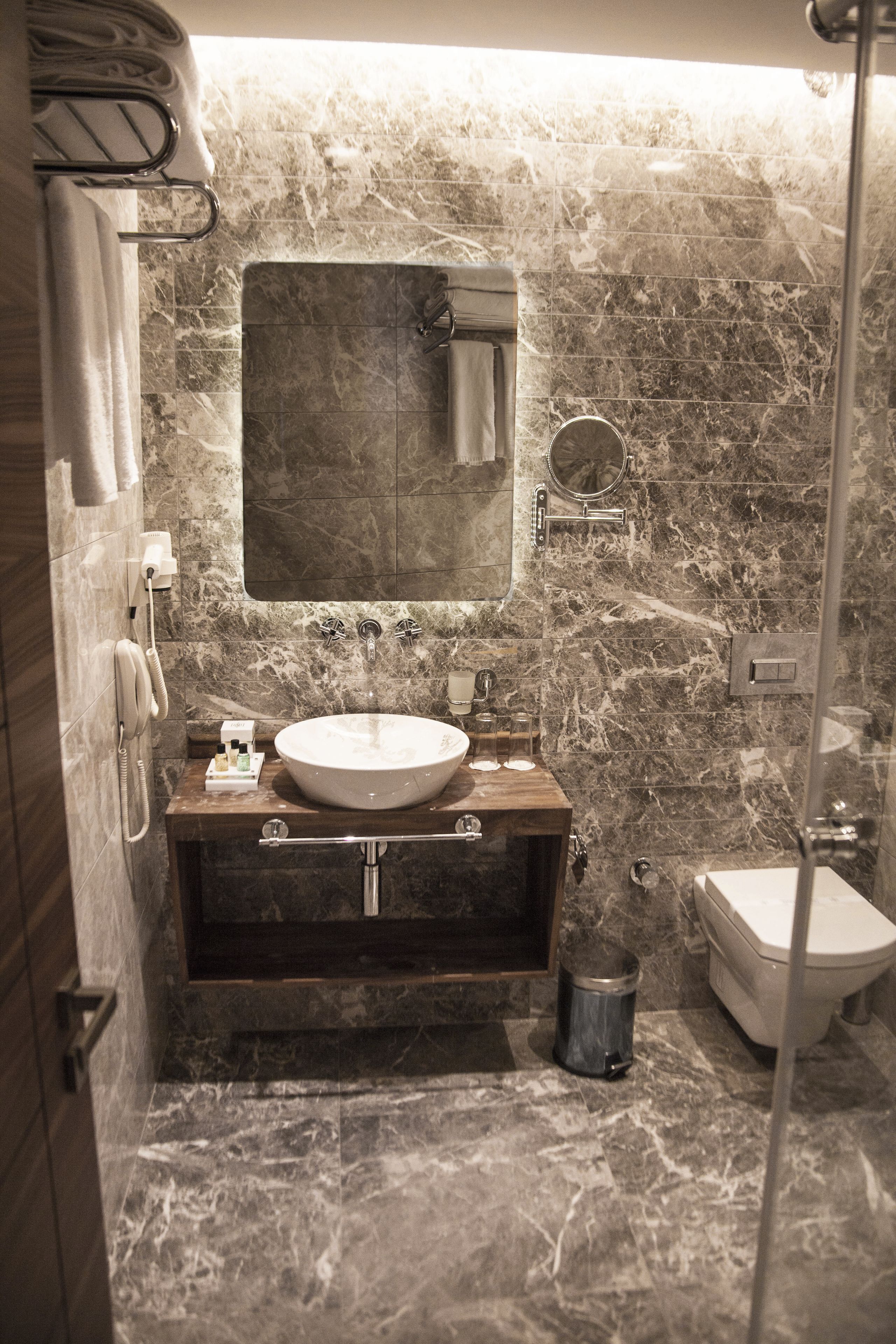 Shower, free toiletries, hair dryer, slippers