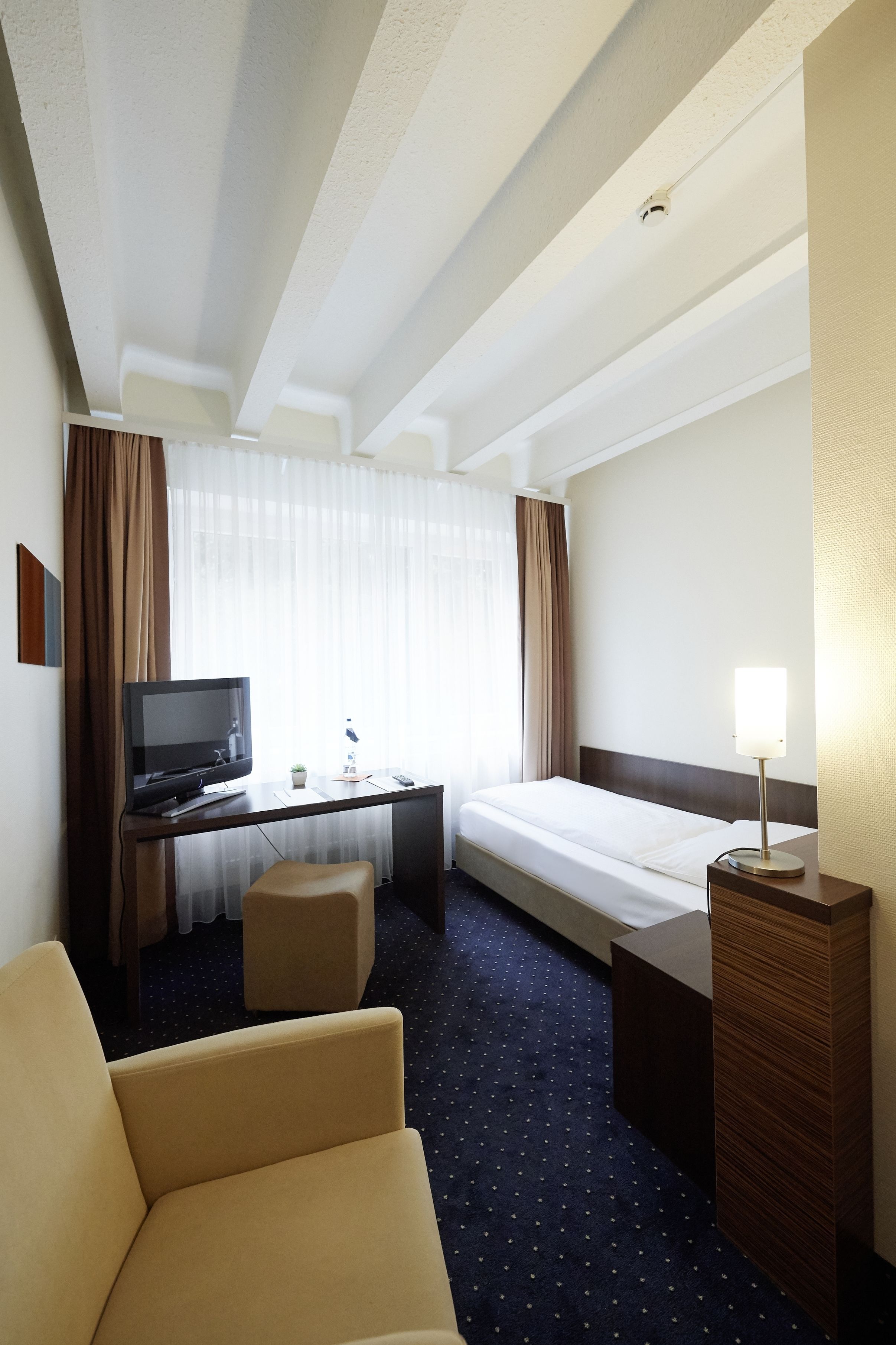 single room | in-room safe, desk, blackout curtains, soundproofing