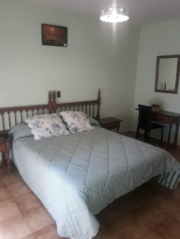 Desk, blackout curtains, iron/ironing board, rollaway beds