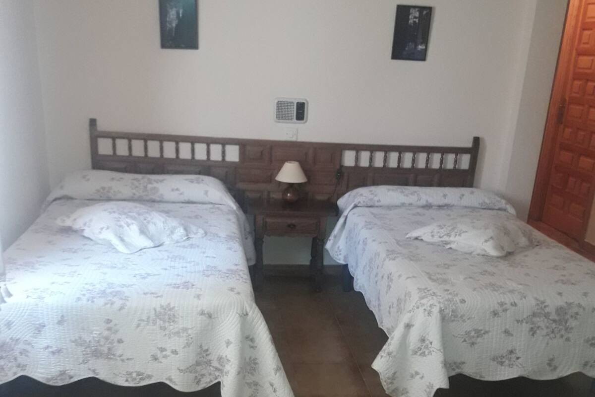 Desk, blackout curtains, iron/ironing board, rollaway beds