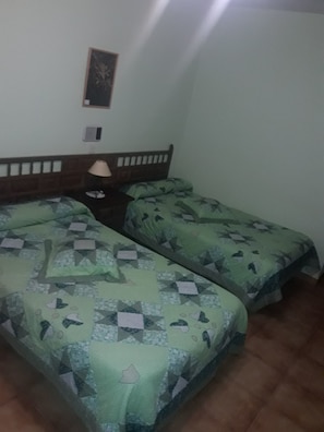 Desk, blackout curtains, iron/ironing board, rollaway beds